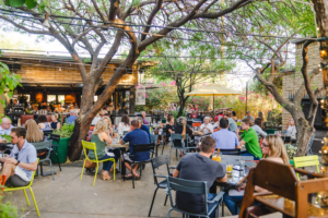 The outdoor patio at Chelsea’s Kitchen located in Phoenix close to Camroad Properties office property.